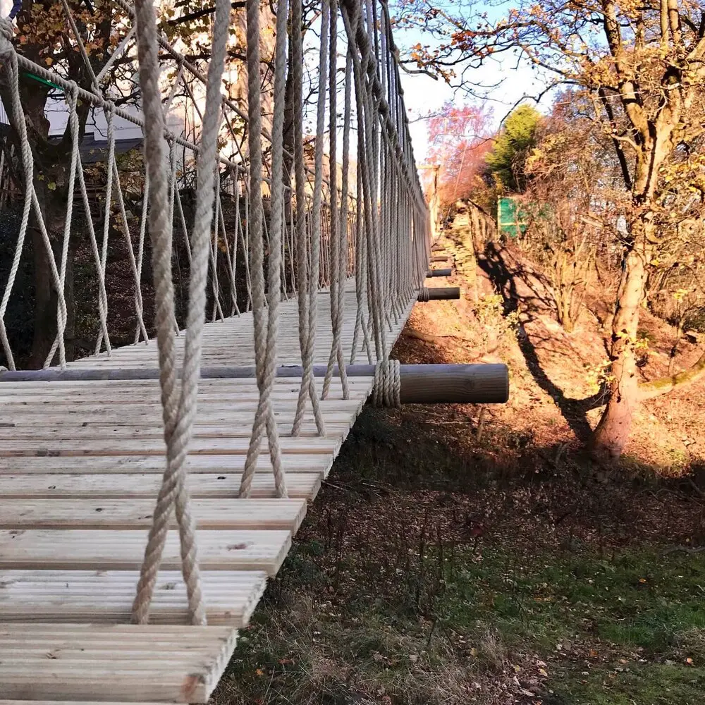 View of Rope Bridge along its length admiring its rope-work balustrades...a delight and breath of fresh air to work with Treehouse Life.