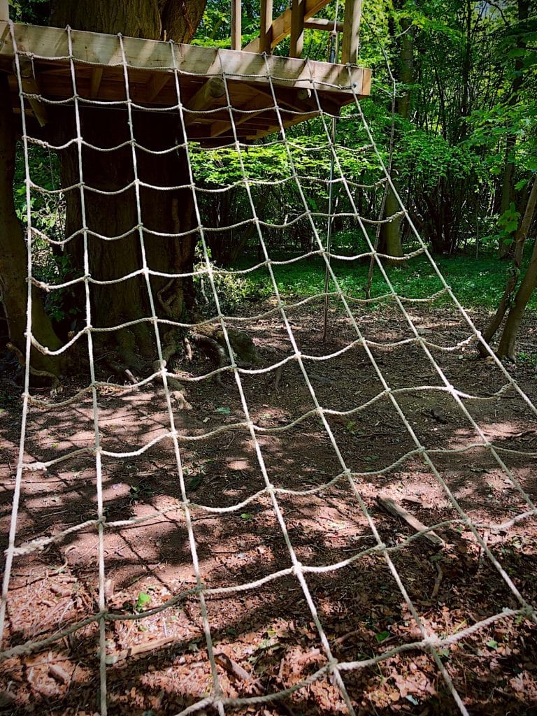 A large cargo net leads to a