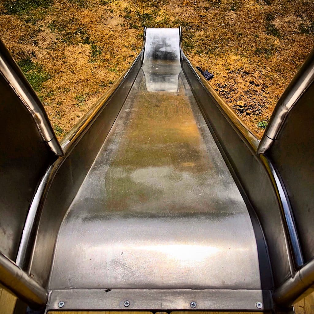 Shot of stainless steel slide from the top of the slide, looking down.