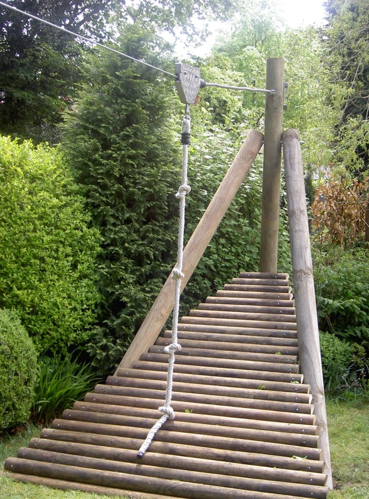 A zip wire and its timber mounting platform constructed in the corner of a large mature garden in Sheffield, UK.